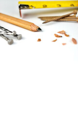 Carpenter's Pencil with Sharpening Shavings, Tape Measure, Framing Nails and Deck Screws