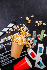 Movie tickets, soda drink plastic straws and popcorn . Home theatre movie or series night concept. Flat lay top view from above with copy space.