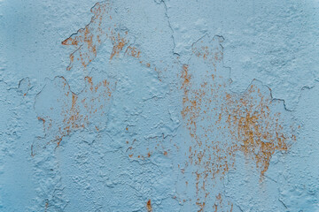 Blue peeling paint with old, worn-out metallic weathered iron texture rough background dirty steel