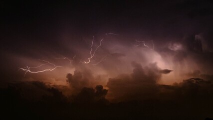 Dark sky background with storm clouds and thunder in Asahan, Melaka, Malaysia.