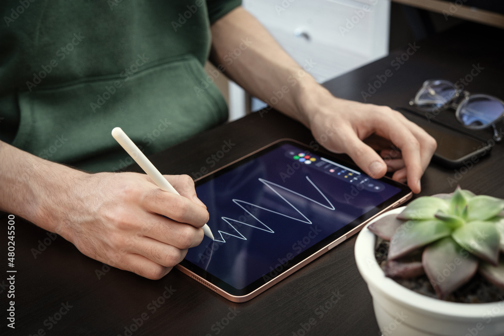 Canvas Prints man using digital tablet for drawing