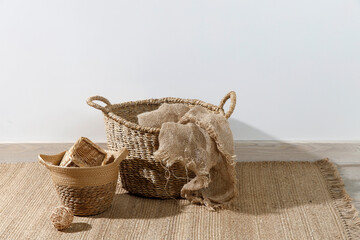 Storage room. Wooden stairs, wicker baskets on a mat. Copy space. Place for text. Copy space