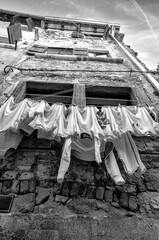 Clothes hanging on the old house