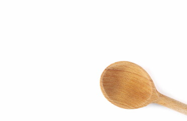 Empty wooden spoon isolated on white  