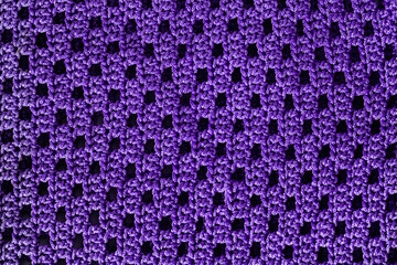 Crochet pattern. Simple knitting pattern. Openwork mesh very peri fabric background.