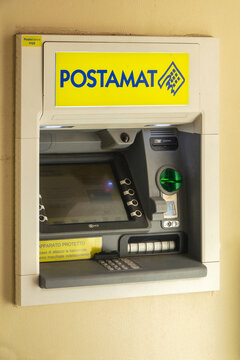 A Postamat cash machine (ATM machine) outiside a postal office in Italy