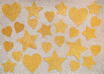 Abstract shiny background with gold stars and hearts. Flat layer.