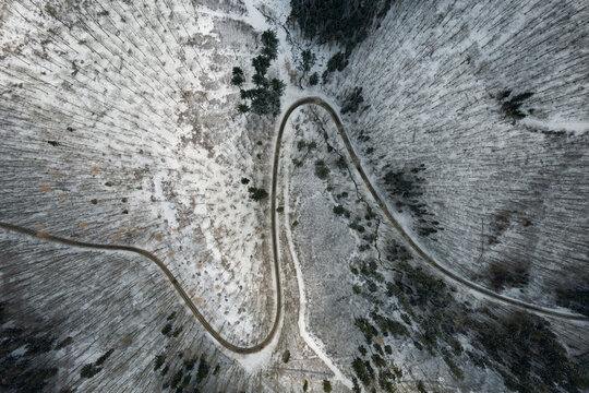 Aerial view of a mountain road in winter. 