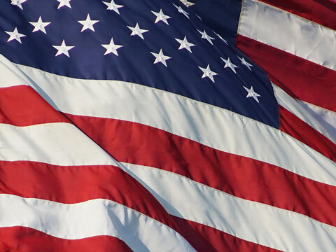 Close up of the US flag waving in the wind