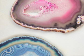 Two Agate stones close-up background. Abstract Pattern Of Agate Stones pink and blue. Closeup...