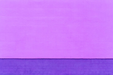Pink and purple paint on the cement wall of the house art design background