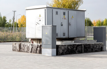 Voltage power transformer substation outdoors in summer