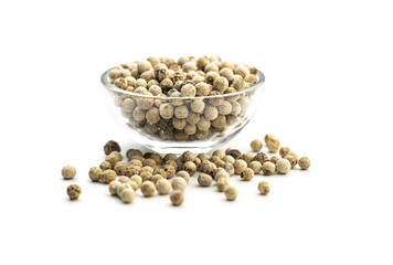 Whole pepper spice. White peppercorn grain in bowl.