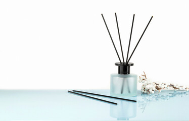 Aromatherapy and home perfume concept - aroma reed diffuse.