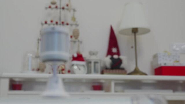 Motion sensor for smart home used to monitor an area and control smart lights. Motion detector turn on off the light in the room. Rack focus. High quality 4k footage