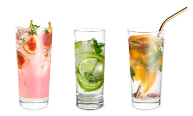 Glass of tasty fig lemonade on white background