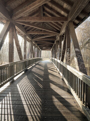 wooden bridge with strong lines and graffiti