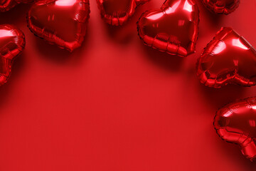 Heart-shaped air balloons for Valentine's day on red background - Powered by Adobe