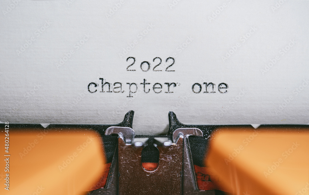 Fototapete Old Typewriter with following text on paper - 2022 Chapter one. new years concept