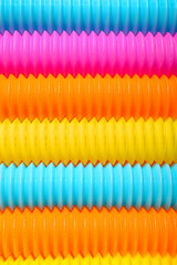 Pop Tubes as background, closeup