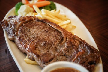 grilled steak with french fries