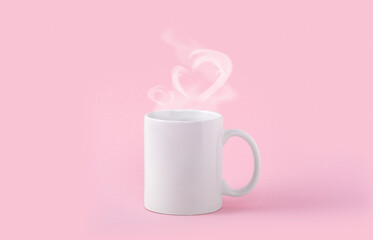 Mockup white coffe cup or mug on a pink background. Hot drink steam in the form of heart