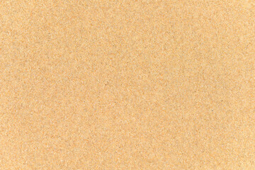 Fototapeta na wymiar Texture of beach sand grains up close.
