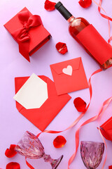 Composition with cards, bottle of wine and rose petals on color background. Valentine's Day celebration