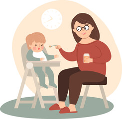 Mother is feeding her baby. The first solid food for a small child. Fresh organic. Weaning a baby. Mom and little boy are eating ready to eat puree.