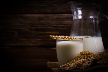 oat milk on wooden background