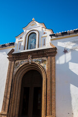 Fototapeta premium Competa is self sufficient and thriving Town with a municipal market. It has a charming flower bedecked old town with its main square, the Plaza Almijara,dominated by a magnificent 16th century church