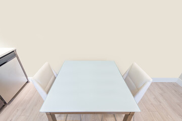 An empty dining table in empty room. Modern dining room in luxury house.