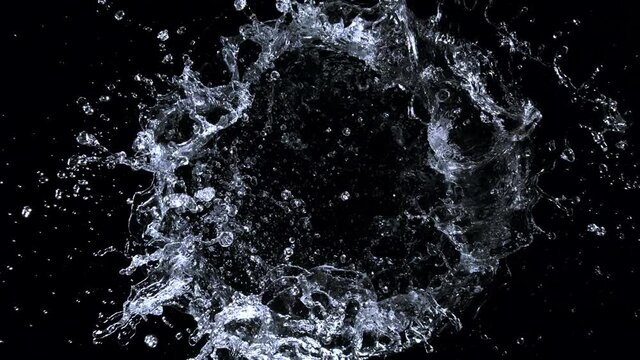 Super Slow Motion Shot of Rotating Water Ring Moving Towards Camera at 1000fps.