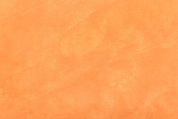 Fototapeta na wymiar Orange plaster wall texture with abstract pattern stucco grunge surface background