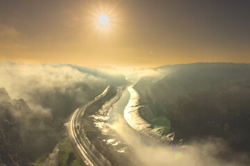 sun on a misty morning over the Avon gorge