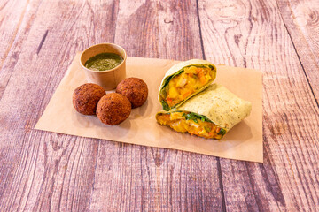 chicken wrap menu with croquettes and sauce to dip