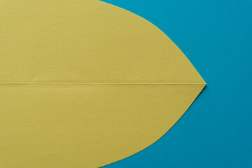 Fototapeta na wymiar paper background in yellow and blue