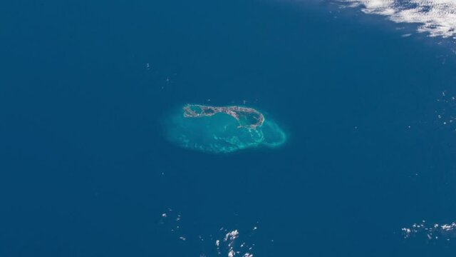 Flying over Bermuda island atlantic ocean, satellite view from space animation base on image by Nasa