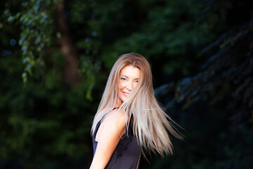 Naklejka premium beautiful blond girl iportrait outddoors