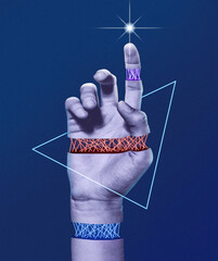 Contemporary art concept. Hand surrounded by light and lasers. Unusual geometric modern art.