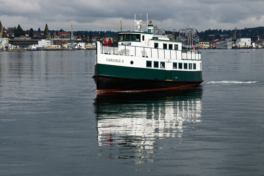 Port Orchard, WA, USA - February 18, 2019; Former Mosquito Fleet vessel operating as the Kitsap Transit Foot Ferry Carlisle II to carry passengers and tourists