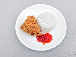 Fried Chicken with Rice on White Plate