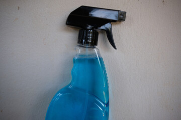 blue spray bottle ,Cleaning products template with copy space. Use trigger sprayer container for...