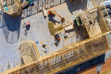 Aerial view the construction wood framing beams of a new house under construction