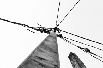 Low angle shot of an Electric pole with wires