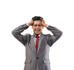 stressed young businessman holding his head isolated