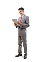 businessman holding tablet pc isolated over white background