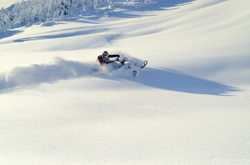 Snowmachine "sledder" rider in Alaska