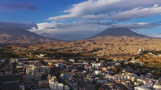 Arequipa cityscape and volcano moving forward drone