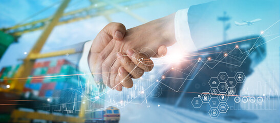 Successful logistic and transportation deal. Businessmen handshake for business partnership, import export global network distribution, shipping freight and smart delivery service.